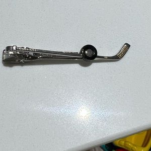 Hockey stick tie clip